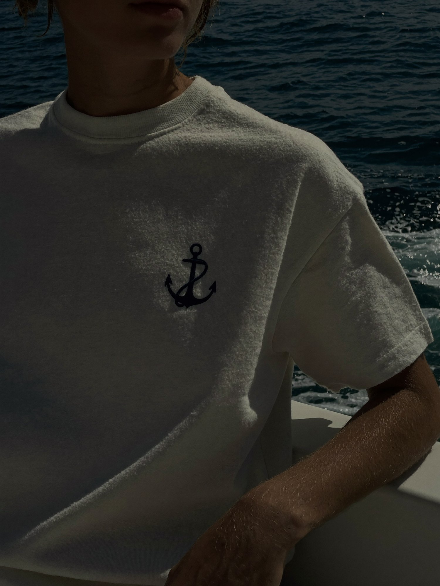 The Anchor Tee worn on deck