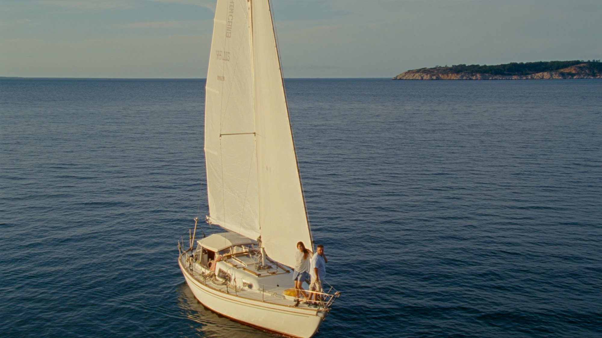 Sailboat crossing open water